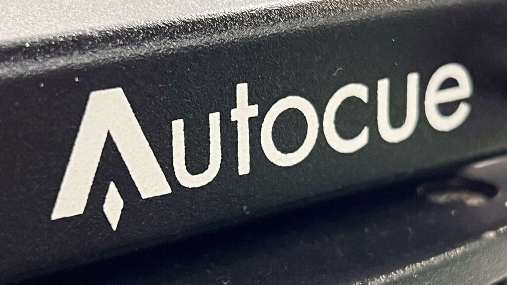 Close-up of Autocue teleprompter brand logo.