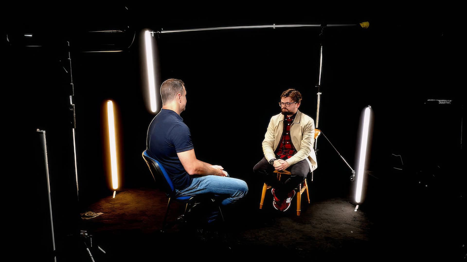 Two people discussing content creation strategies.