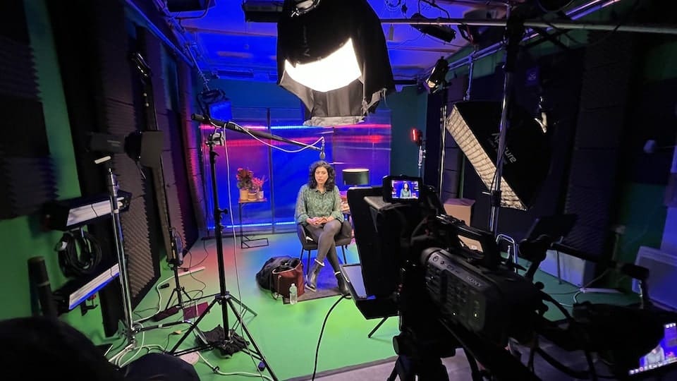 Amaran lights setup with hard lighting effect on woman in Live Suite studio