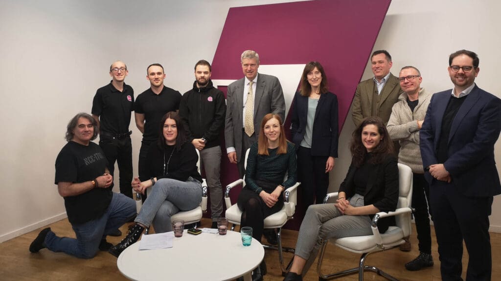 A group of professionals gathered in office